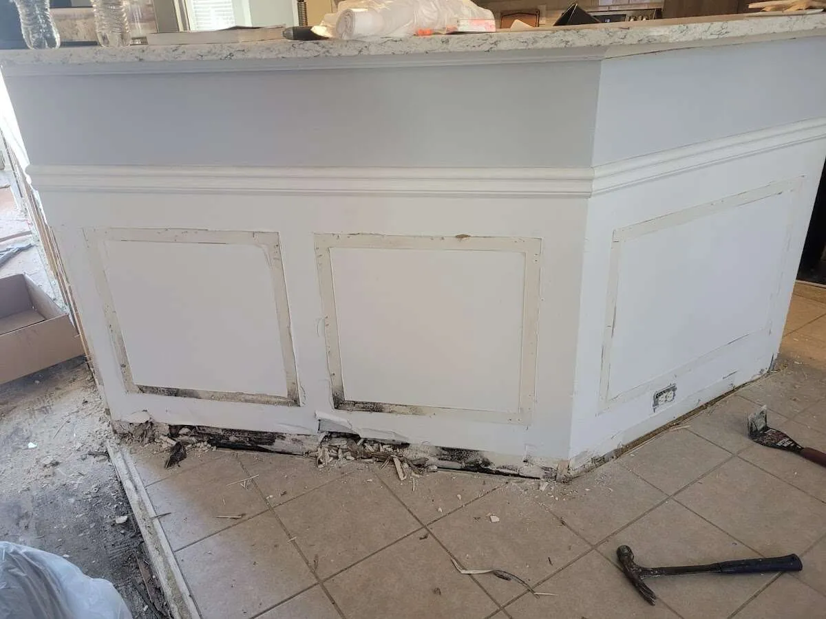 Water damage and mold on kitchen during Storm Damage Restoration in Ludlow